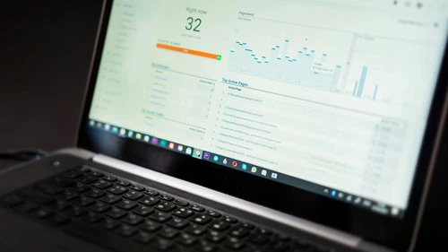A laptop screen showing Google Analytics